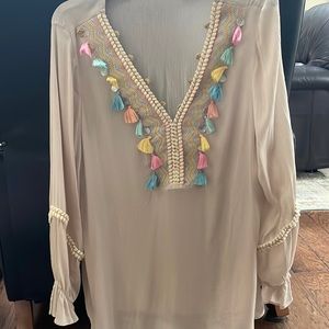 Worn once. Bohemian style with pretty, braided blossom sleeves.